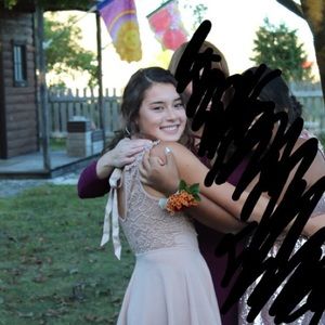 Nude homecoming dress with back bow